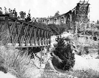 A 1913 view of the Scoville Bridge next to the partially completed Colorado Street Bridge.