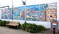 One of two painted historical murals in St Marys near Queen Street. Several icons of the suburb's history and landmarks are depicted, such as Bennett's Wagon Works, St Marys Magdalene Church, tannery workshops, the St Marys District Band,[37] and possibly the post office