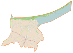 Mapa konturowa powiatu nowodworskiego, blisko centrum u góry znajduje się punkt z opisem „Sztutowo”