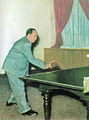 Mao jugando tenis de mesa.