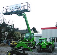 Chariot télescopique Merlo à double commande avec nacelle.