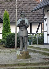 Standbeeld in het centrum Afrouper (Dorpsomroeper), gemaakt door Anne Daubenspeck-Focke