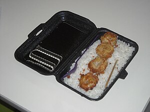 Fried scallops on a stick served with rice