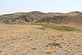 Looking across the small ravine that contains the petroglyphs