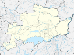 Mapa konturowa powiatu pszczyńskiego, w centrum znajduje się owalna plamka nieco zaostrzona i wystająca na lewo w swoim dolnym rogu z opisem „Zbiornik Łąka”