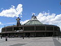 The modern Basilica of Our Lady of Guadalupe in Mexico City has the famous image of Mary, Patron of the Americas.