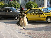 Une Iranienne vêtue d'un niqab à Bandar Abbas.