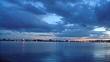 Large manmade lake, with Hyderabad in the far distance