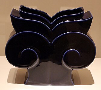 Postmodern vase inspired by the Ionic capital, deisgned by Michael Graves for Swid Powell, 1989, glazed porcelain, Indianapolis Museum of Art, Indianapolis, US[32]