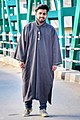 A young man wearing Pheran somewhere in Chenab Valley's Doda district