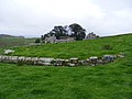 Reste eines Straßenwärterhauses (Beneficarius Consularis), im Hintergrund die Housesteads Farm