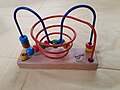 Image 15A bead maze (from List of wooden toys)