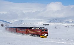 Norges Statsbaner Di 4 with the daytime train from Bodø to Trondheim (Nordlandsbanen), passing the Saltfjellet between Lønsdal and Bolna.