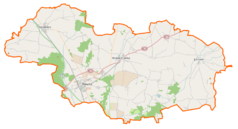Mapa konturowa powiatu rawickiego, w centrum znajduje się punkt z opisem „Chojno”