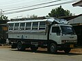 Image 93Medium-sized Hino Songthaew (truck bus) as seen in Sakon Nakhon, Thailand. (from Combination bus)