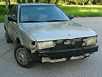 A decrepit Nissan Sentra.