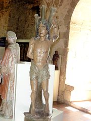 Saint Sébastien Statue en bois polychrome du XVIe siècle
