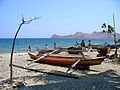 Canoes on shore at Dili