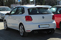 Rear-three-quarter view of a car with twin exhausts