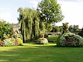 Rosengarten mit Blumen-Enten