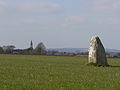 Le bourg et le menhir de la Roche au Diable.