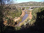 The river passes under the A22-IP1 motorway[6] north of the Castle of Paderne.