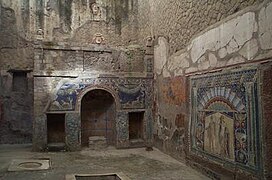 House Number 22 is noted for this outstanding summer triclinium with a nymphaeum decorated with coloured mosaics.
