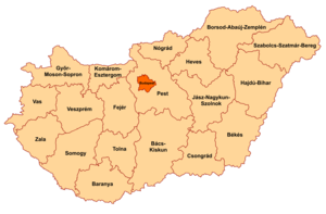 Mapa da Hungria com os 19 condados em laranja e a capital Budapeste em vermelho