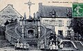 Le calvaire du bourg de Bignan vers 1920 (carte postale).