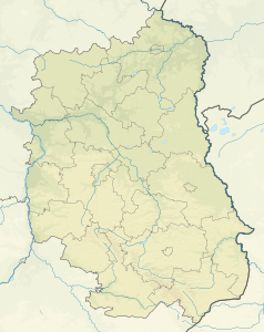Mapa konturowa województwa lubelskiego, blisko centrum na dole znajduje się punkt z opisem „źródło”, natomiast blisko centrum po prawej na dole znajduje się punkt z opisem „ujście”