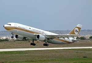 An Airbus A300B4-600R painted in the livery of Libyan Arab Airlines takes flight, leaving the runway at Malta International Airport.