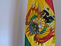 Coat of arms of Bolivia in the National Flag.