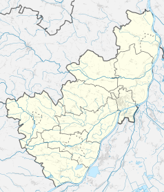 Mapa konturowa powiatu sandomierskiego, po prawej znajduje się punkt z opisem „Sandomierz”