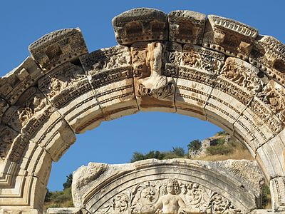 Roman leaf-and-dart right above the rinceaux and under the dentils, on the Temple of Hadrianus, Ephesus, Turkey, unknown architect, 138