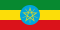 The flag from 1996 to August 2009. Its central disc is smaller than in the current flag.