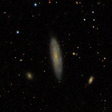 NGC 6390 — спирална галаксија во соѕвездието Змеј