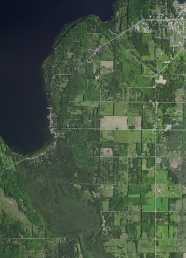 The village limits of Ephraim reach from inside the eastern portion of Peninsula State Park (far left) to the more developed area along Eagle Harbor (center) to the western portion of Little Sister Bay (far right)[11]