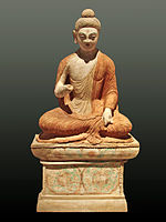 A statue depicting Buddha giving a sermon, from Sarnath, 3,000 km (1,864 mi) southwest of Urumqi, Xinjiang, 8th century