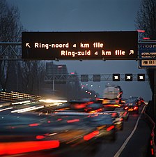 Dynamic Route Information Panel (DRIP) on Dutch A13 freeway during evening rush hour