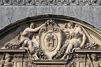 Renaissance cartouche in a pediment of the west facade of the Cour Carrée of the Louvre Palace, Paris, designed by Pierre Lescot, 16th century[9]