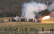 A U.S. Marine Corps artillery battery at the George Bush Presidential Library Center at Texas A&M University fires a 21 gun salute on December 6, 2018.