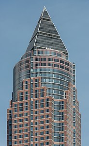 Messeturm in Frankfurt, Germany, by Helmut Jahn (1990), a Postmodern building that is reminiscent of Art Deco architecture[163]
