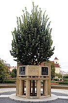 Vojáček family monument in front of the National House in Prostějov