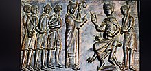 Рахдониты Святой Адальберт Пражский умоляет Болеслава II, герцога Богемии, освободить христианских рабов их хозяевами, еврейскими купцами, Гнезненские врата ок. 1170