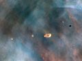 Image 7Hubble image of protoplanetary discs in the Orion Nebula, a light-years-wide stellar nursery probably very similar to the primordial nebula from which the Sun formed (from Formation and evolution of the Solar System)