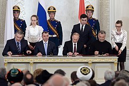 Van links naar rechts: S. Aksyonov, V. Konstantinov, V. Poetin en A. Chalyi.