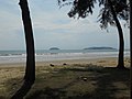 Tanjung Aru beach. Pulau Sulug can be seen on the left and Pulau Manukan on the right of the horizon.