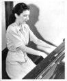 Violet Archer at the piano. Source: University of Alberta Archives