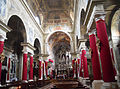 L'interno della chiesa parato di rosso durante la festa patronale.