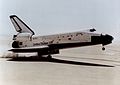 Columbia landing on Rogers Dry Lake bed at Edwards Air Force Base, on 14 April 1981.